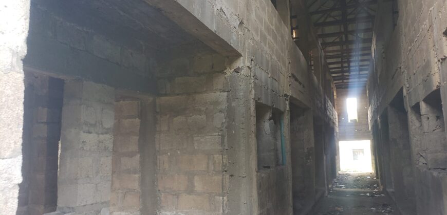 A storey Building of 20 Units of room selfcon for sale and Extra plot of land