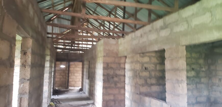 Uncompleted 18 rooms selfcon for sale on 4plot of land