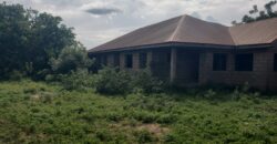 Uncompleted 18 rooms selfcon for sale on 4plot of land